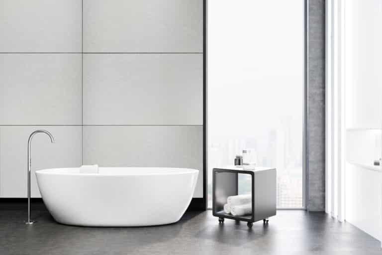 Gray bathroom interior, table closeup